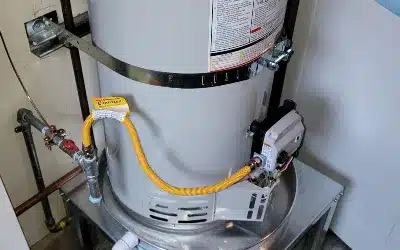 water-heater (1) Residential water heater installation with yellow flexible gas line and safety strapping